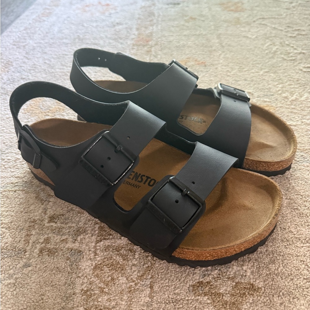 Birkenstock Black Sandals with Adjustable Straps and Contoured Footbed